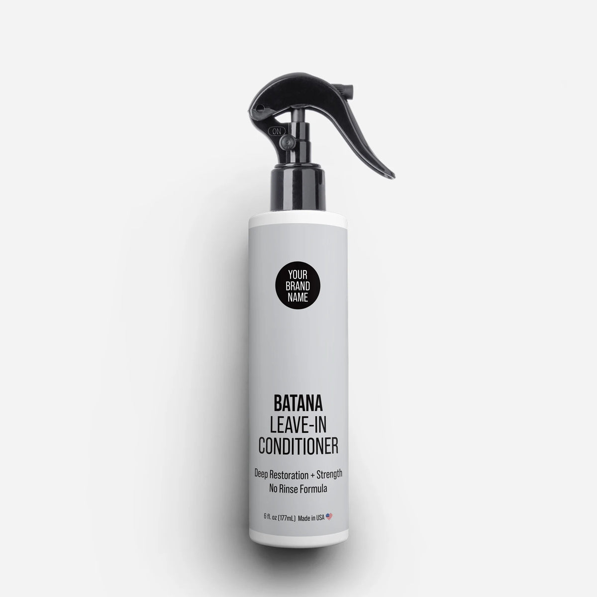 Private Label Batana Leave-In Conditioner featuring deep restoration, strength, and no-rinse formula in a trigger spray bottle, made in USA